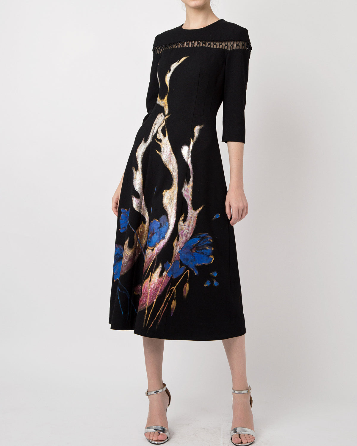 Phoenix in poppy-painted  mid-length Sleeve Black Skater Dress.