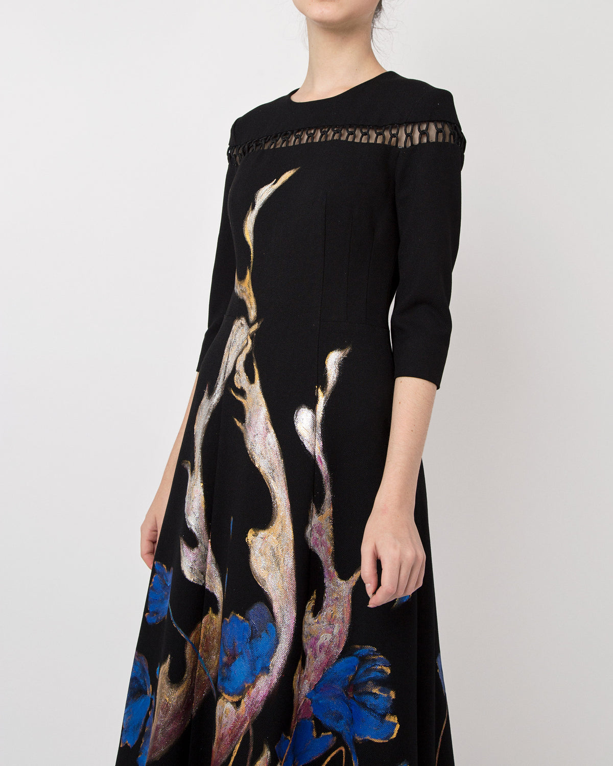 Phoenix in poppy-painted  mid-length Sleeve Black Skater Dress.